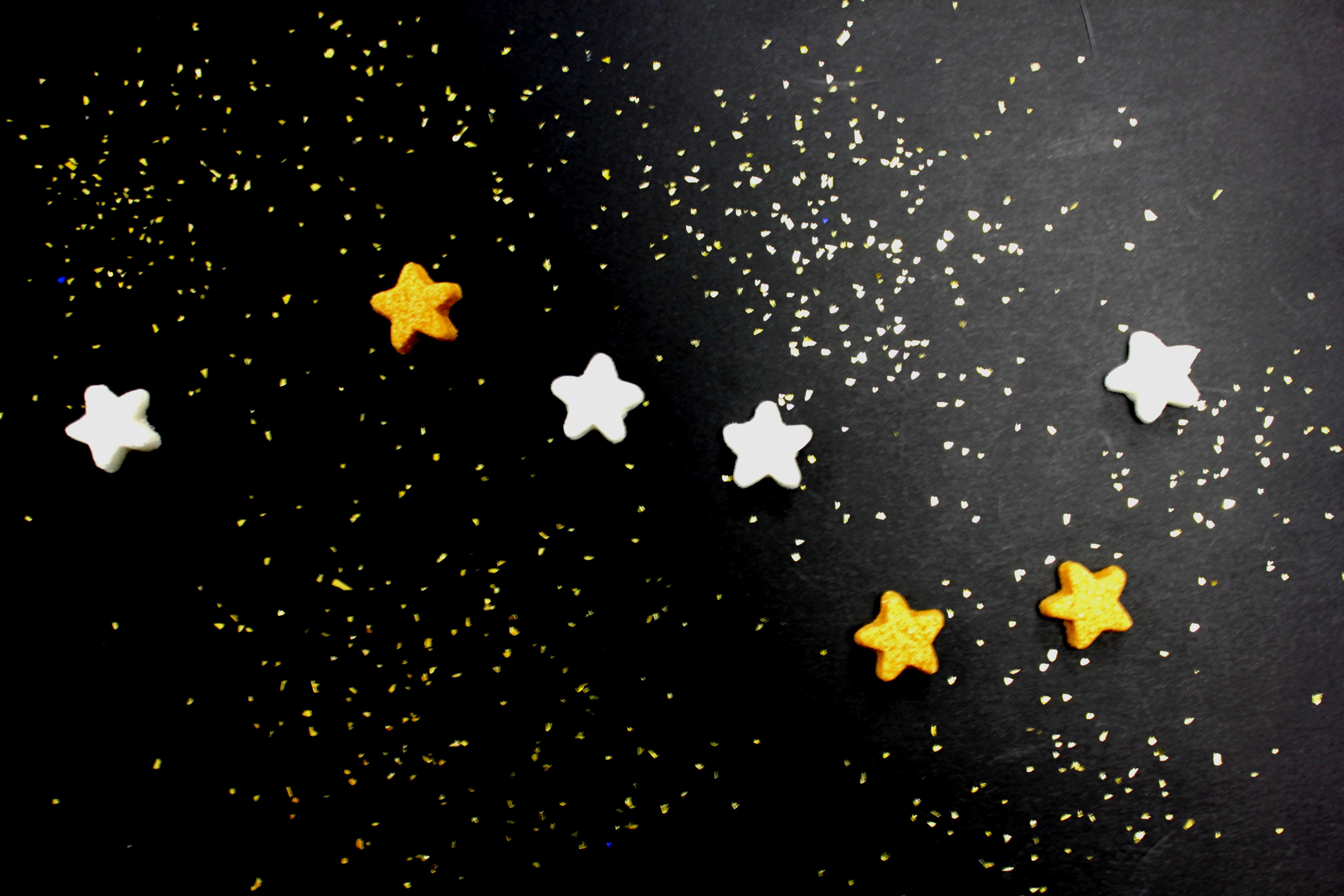 Réglette de 10 mini étoiles en sucre de canne blanc et roux