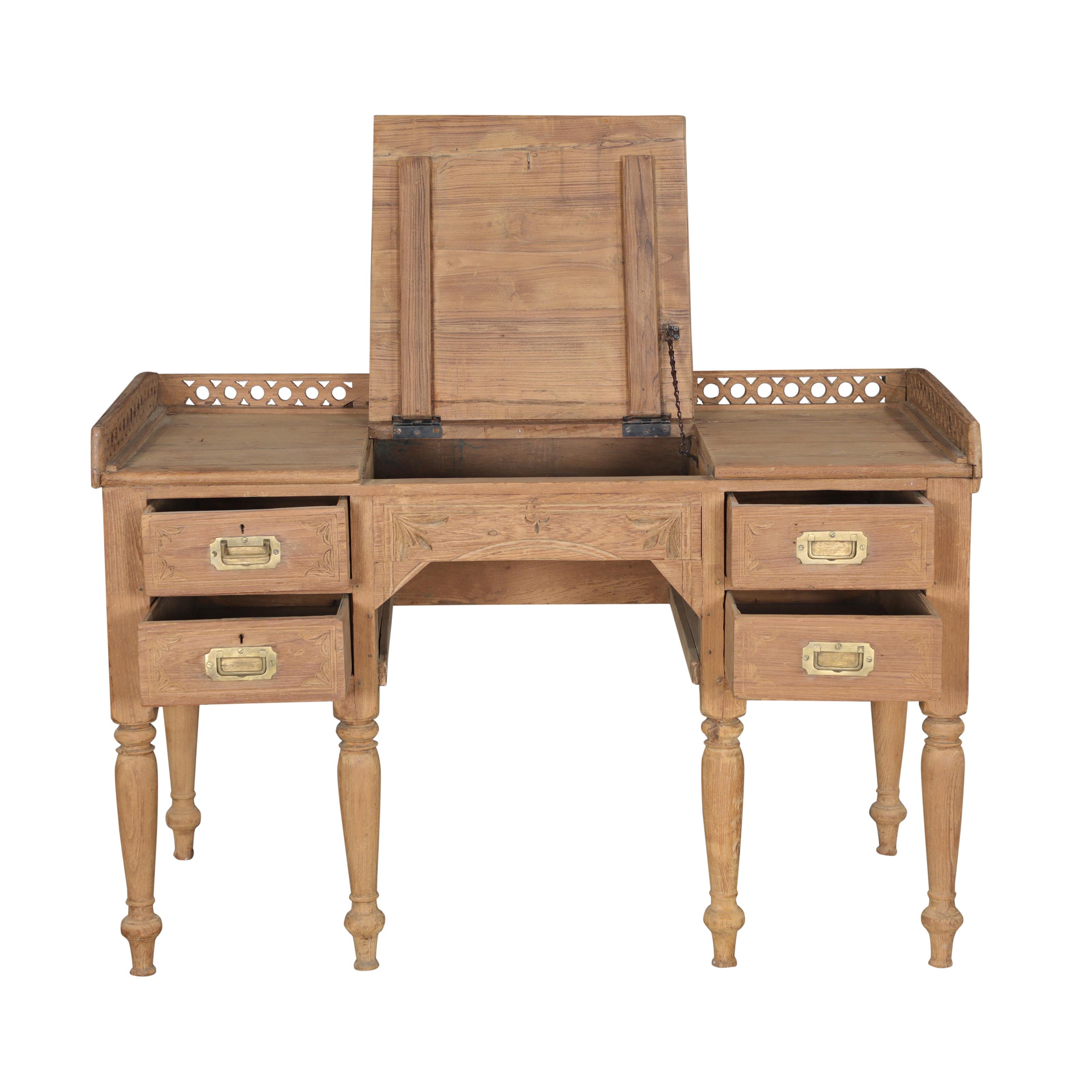 Bureau 4 tiroirs en teck ancien