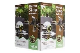 Balle tournate contre héron et pigeon