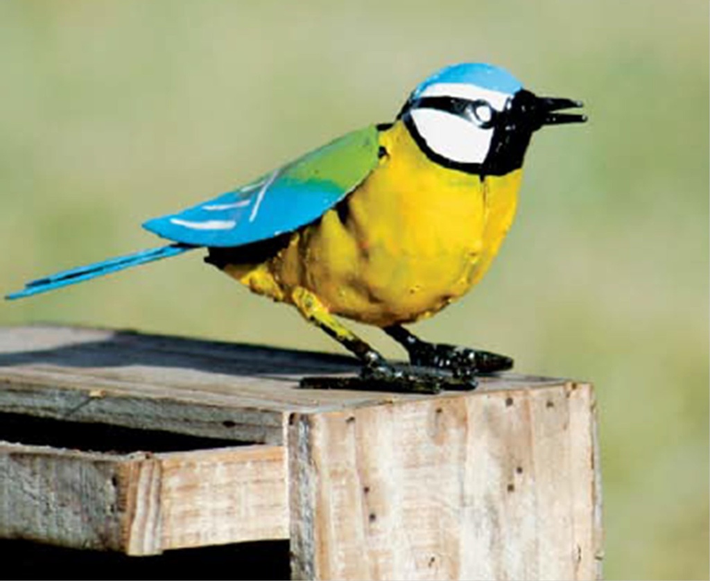 Oiseau métal couleur peint main