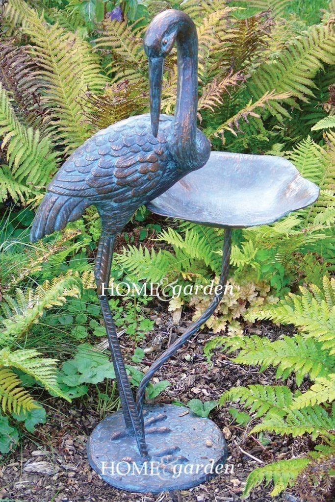 Echassier et abreuvoir